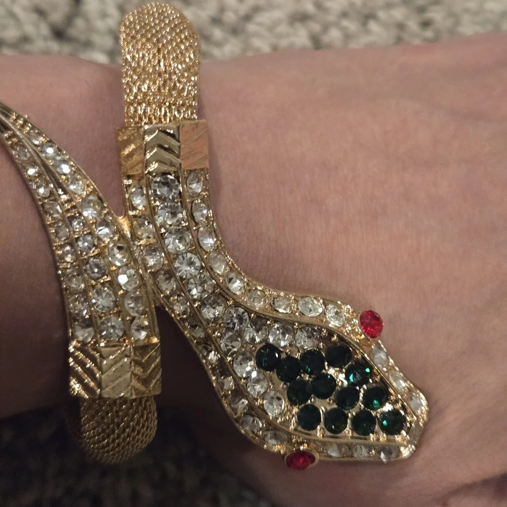 Elegant Gold Snake Bracelet with Green and Red Accents